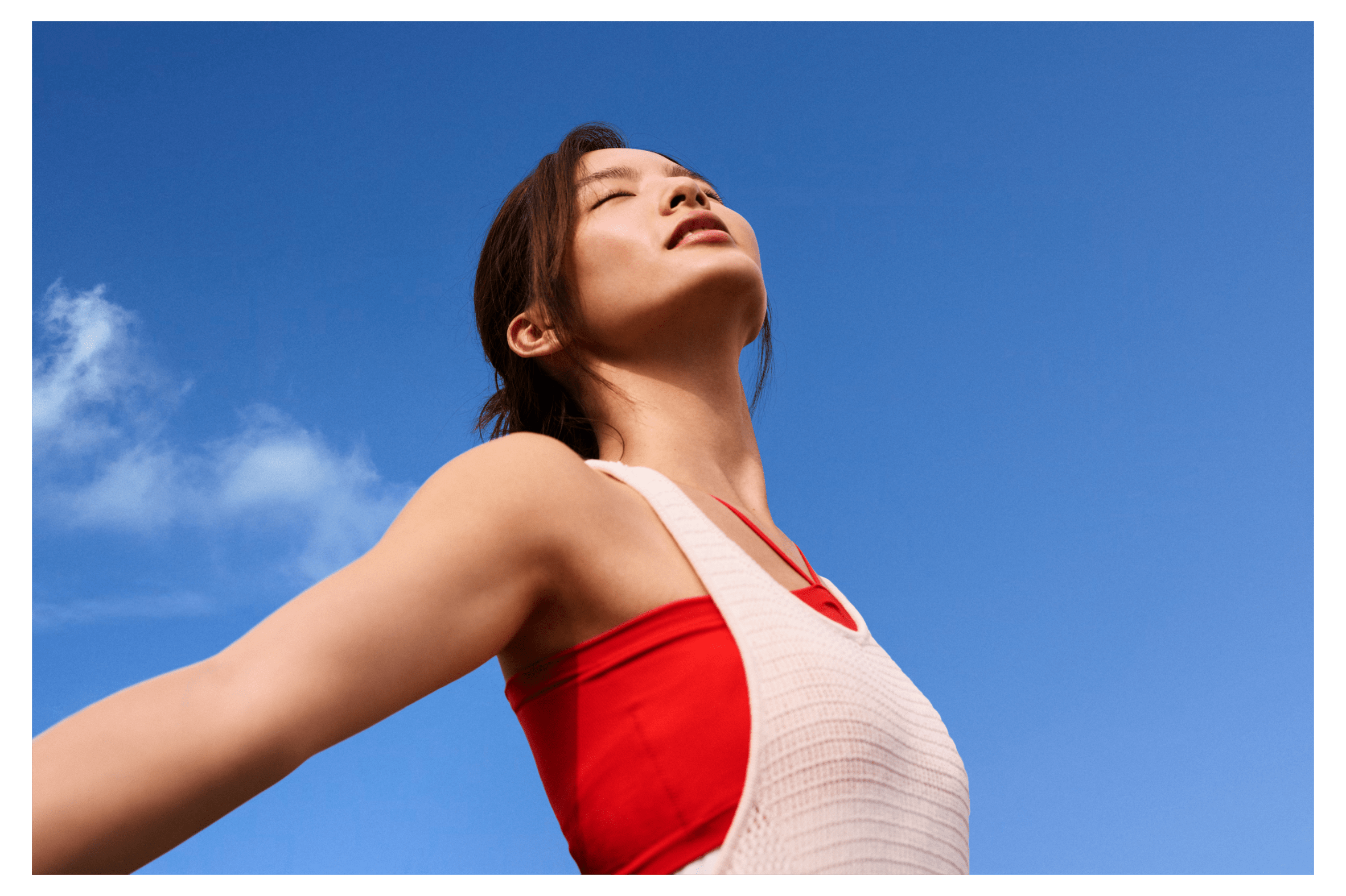 Rewards & Benefits Career - laughing couple at the beach, him carrying her on his back